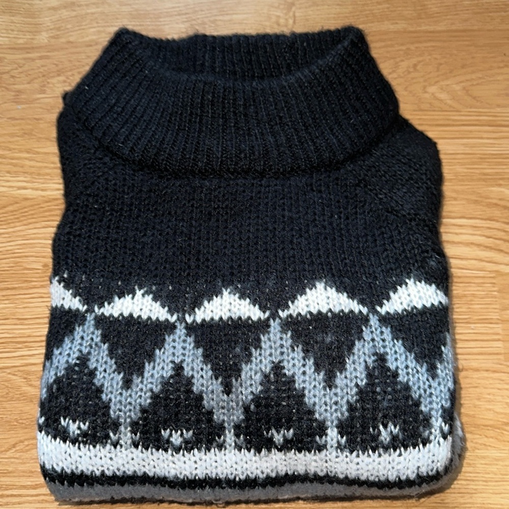 black, grey, and white sweater